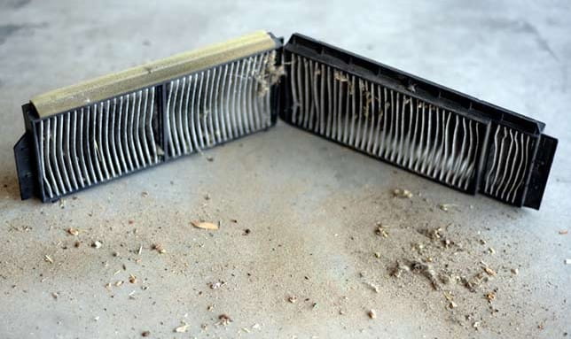 How to change the cabin filter on a Mazda 3 car