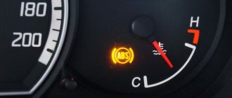 How many kilometers will a car travel if the fuel indicator lights up?