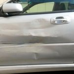 removing dents and scratches on a car